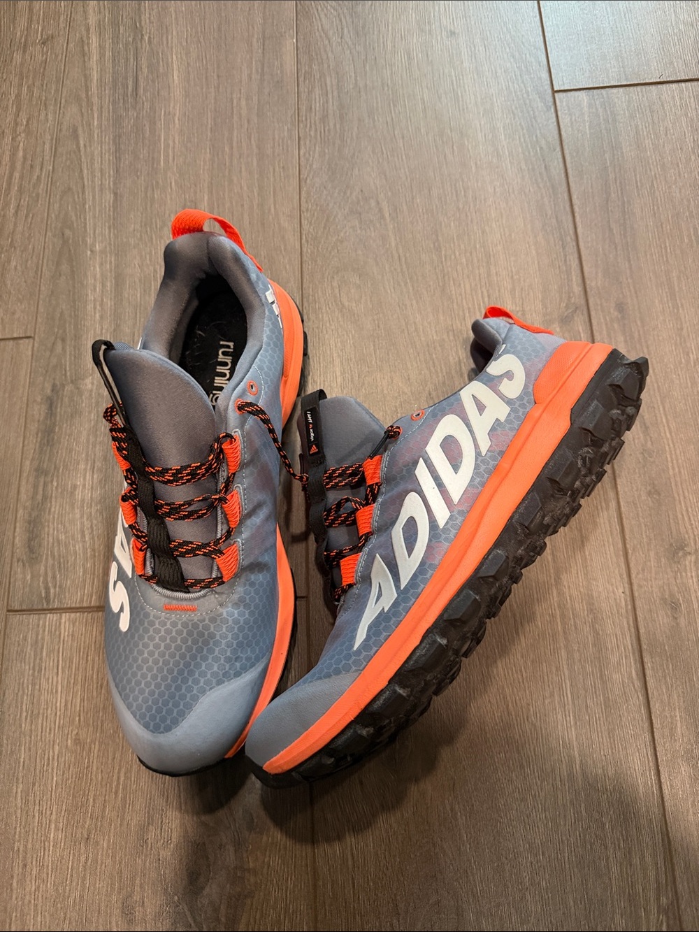 adidas Gray and Orange Trail Sneakers with High-Contrast Laces